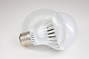 Energy saving LED light bulb on white background. Energy saving concept