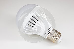 Energy saving LED light bulb on white background. Energy saving concept