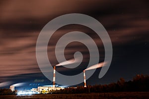 Energy. Smoke from chimney of power plant or station. Industrial landscape.