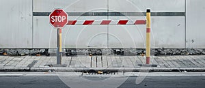 Enforcing Safety: The Stop Sign Barrier at the Parking Area Entrance