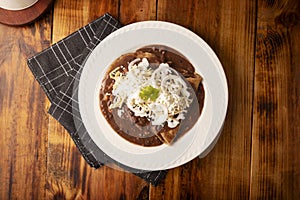 Enfrijoladas recipe table topview photo