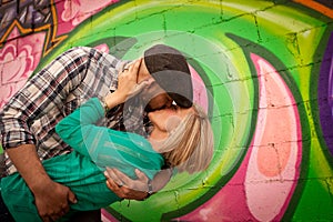 Engaged Young Couple Kissing