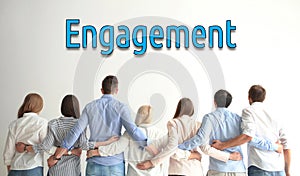 Engagement concept. People hugging on light background