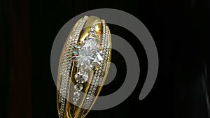 Engagement gold ring with jewelry gem rolling .
