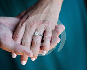 Engagement Ring hand in hand photo