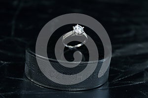 Engagement Ring on hockey puck with the inscription `Czech Republic` on the SILVER background.