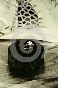 Engagement Ring on hockey puck with the inscription `Czech Republic` on the SILVER background.