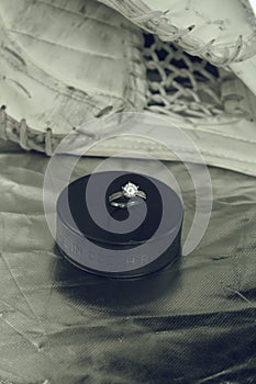 Engagement Ring on hockey puck with the inscription `Czech Republic` on the SILVER background.