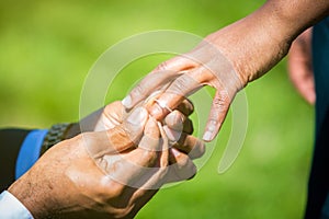 Engagement ring proposal hands close up