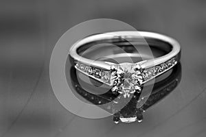 Engagement Ring on a reflective surface