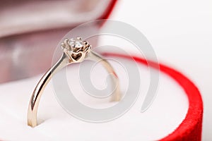 Engagement ring from the white gold with diamond in red velvet gift box