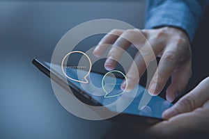 Engaging in digital chat and online messaging on a tablet device.