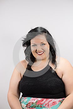 Engaging Portrait of a young woman model against a white backdrop