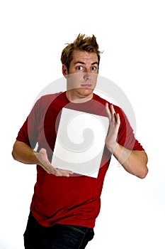 Engaging Young Man holding a blank white sign photo