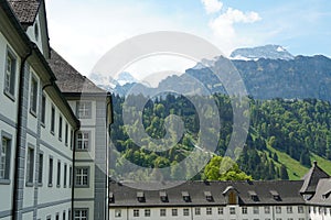 Engelberg Abbey, Benedictine Monastery lateral and partly yard view with Alp slopes