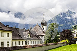 Engelberg Abbey, a Benedictine monastery wiht Alps mountains