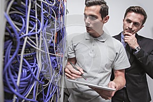 Engeneers in network server room