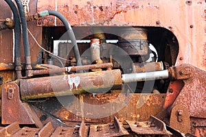 Engine of an abandoned Marshall tractor on Aldeburgh beach. UK