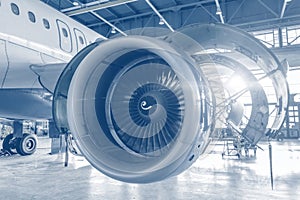 Engine of the airplane under heavy maintenance, open hood