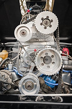 Vehicle engine bay and supercharger photo