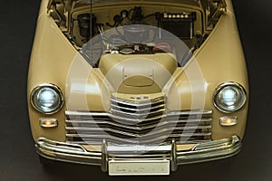 Engine bay view of a retro car