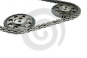 Engine chain and gears on white background