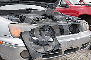 Engine Compartment with fan hanging out