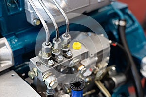 Engine details background close up. Diesel engine. Fragment of a diesel motor close-up. Selective on the fuel injection