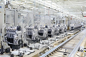 Automated production line with new engines in car factory