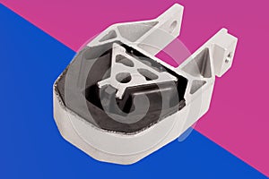 Engine mount. Metal frame, aluminum, resonant part pressed into it. For damping engine vibrations. Spare part. Close-up photo