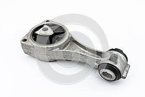 An engine mount, in the shape of an arm, used to stabilize the diesel power unit, isolated on a white background with a clipping p photo