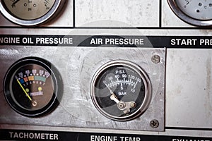 Engine oil pressure gauge on the control panel.