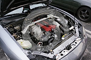 The engine of the old car, the bonnet is open