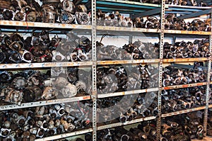 Engine parts in a car breakers shelf