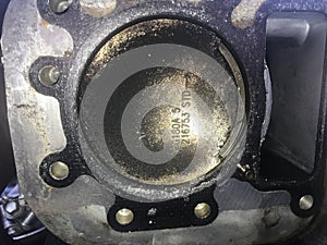 Engine piston with chunk missing