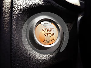 Engine start button of car.