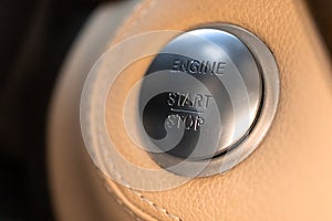 Engine start and stop button in luxury sport car close-up view