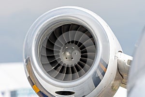 Engine on the tail of a private small jet