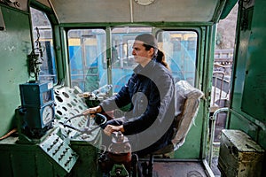 Engine train driver inside of locomotive control room