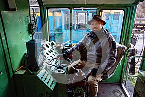 Engine train driver inside of locomotive control room