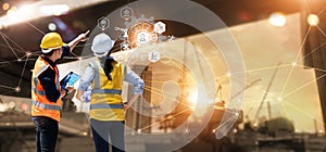 Engineer and Architect analyzing of under construction project with technology and new innovative on digital tablet and icon