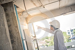 Engineer or Architect checking construction site