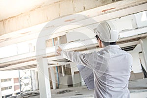 Engineer or Architect checking construction site