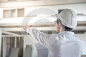 Engineer or Architect checking construction site