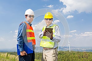 Engineer and Architect discuss over Digital Wireless Tablet