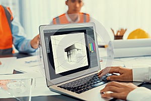 Engineer and architect using architect designing software together. Insight