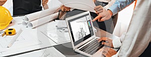 Engineer and architect using architect designing software together. Insight