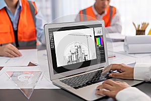 Engineer and architect using architect designing software together. Insight