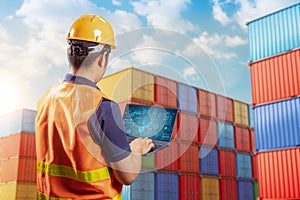 Engineer or asian worker work at container terminal