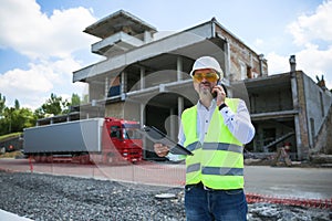 Engineer builder at construction site